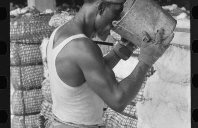 Cotton Compress worker taking a break