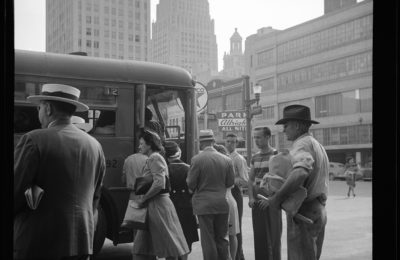 Passengers boarding a bus in Downtown Houston