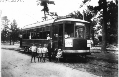 Houston Heights streetcar operator with local kids